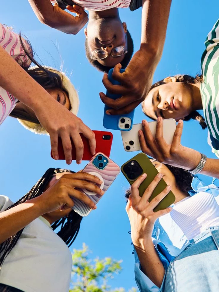 Diverse South Africans enjoying phone accessories — cases, earbuds and chargers from MobiDokta Pretoria